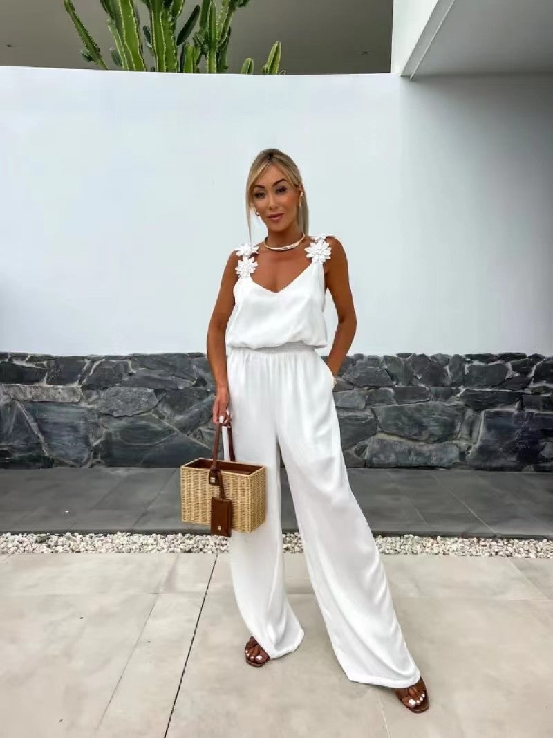 Anita™ Ärmlös jumpsuit med vida ben och halvöppen rygg