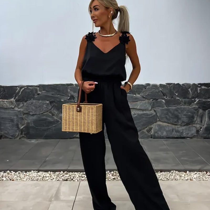 Anita™ Ärmlös jumpsuit med vida ben och halvöppen rygg